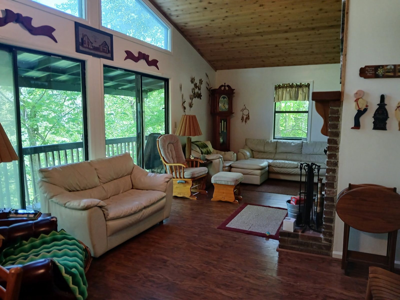 The living room with sliding doors to the deck